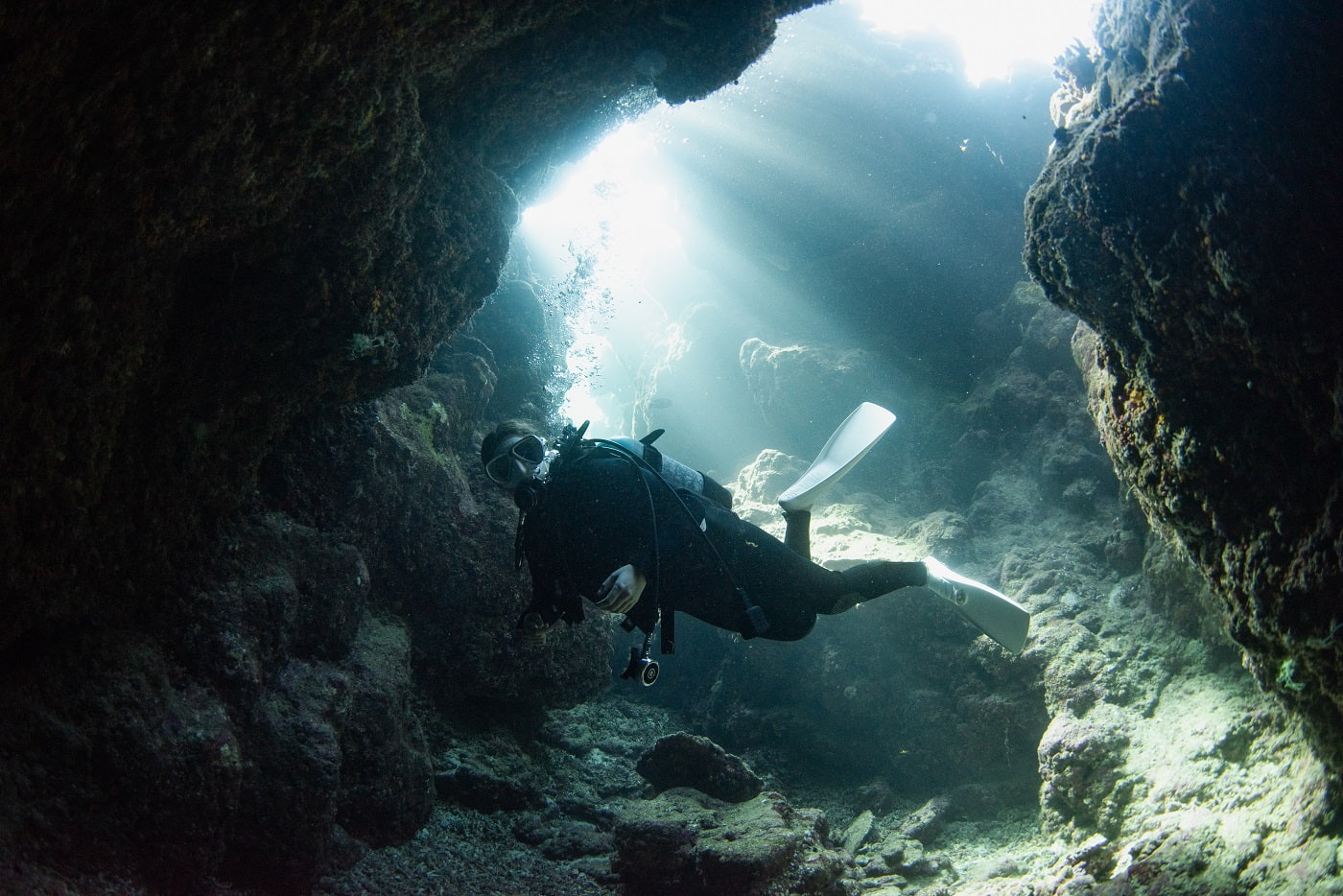 guest diving in the cave