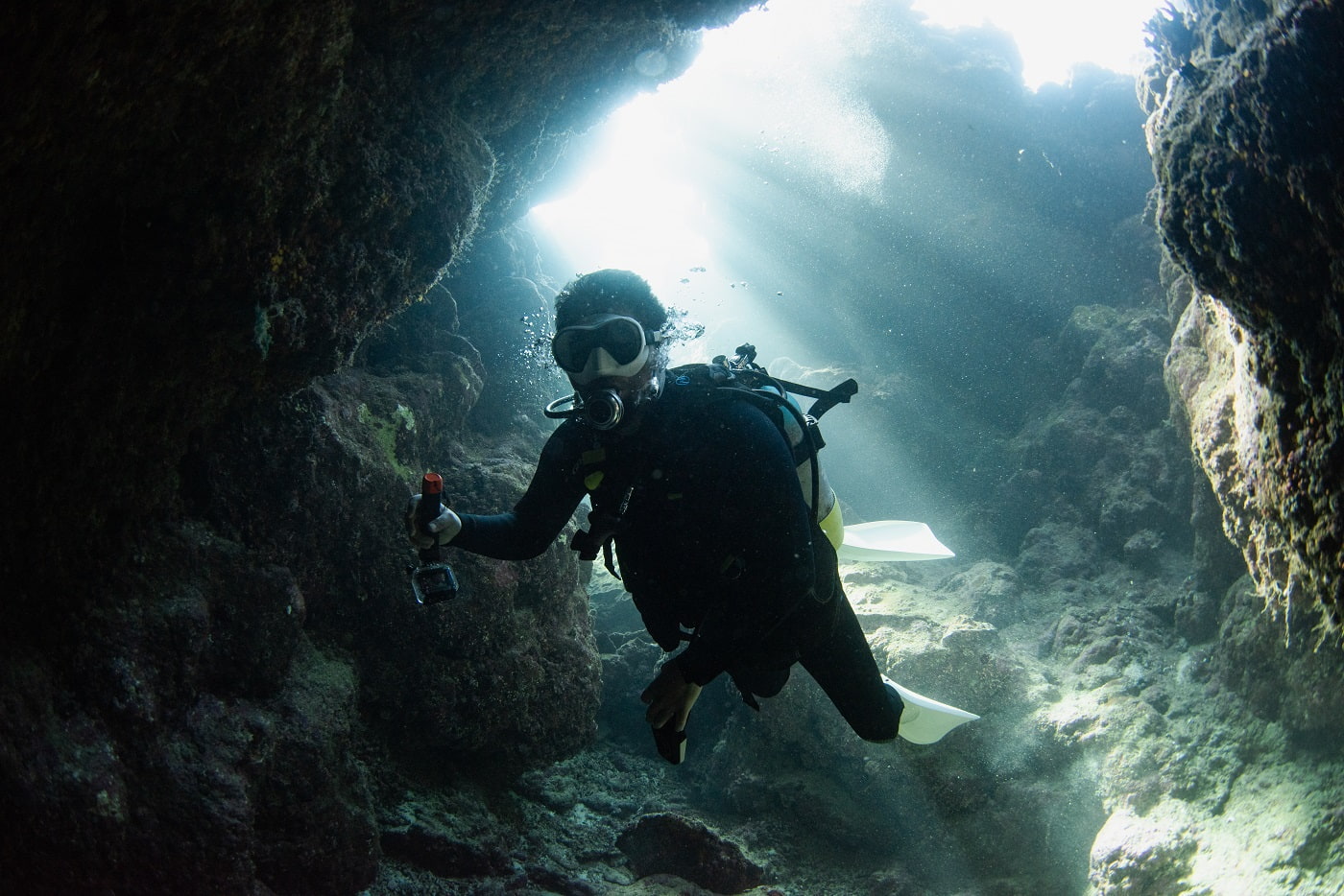 guest diving in the cave