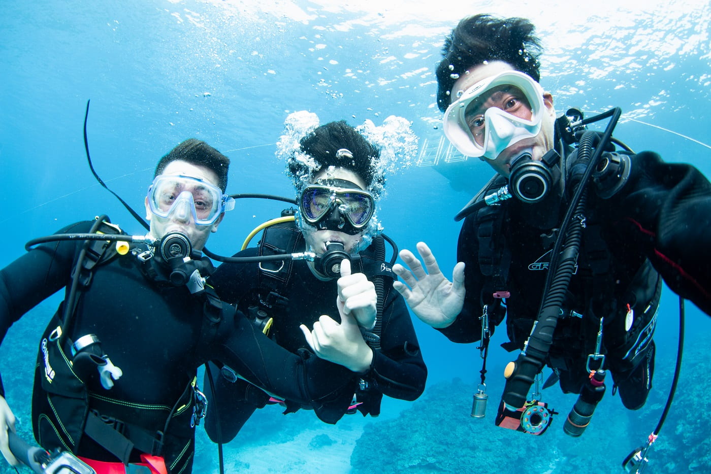 a photo with guests during the dive