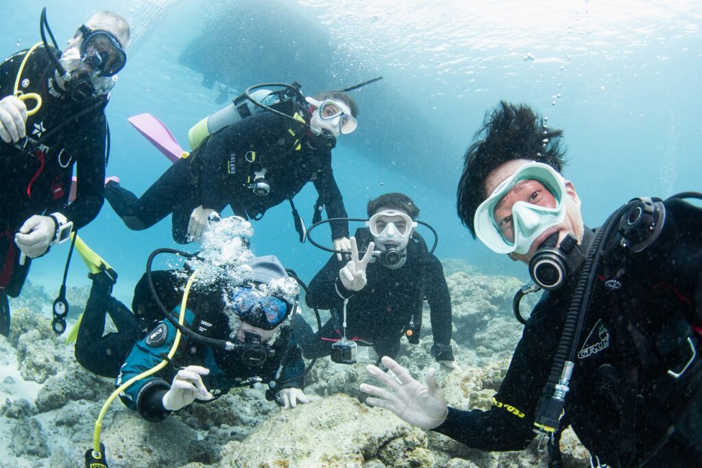 a photo with guests underwater