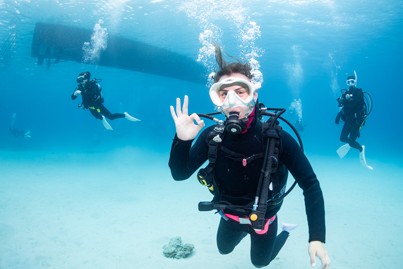 guests diving in the kerama islands