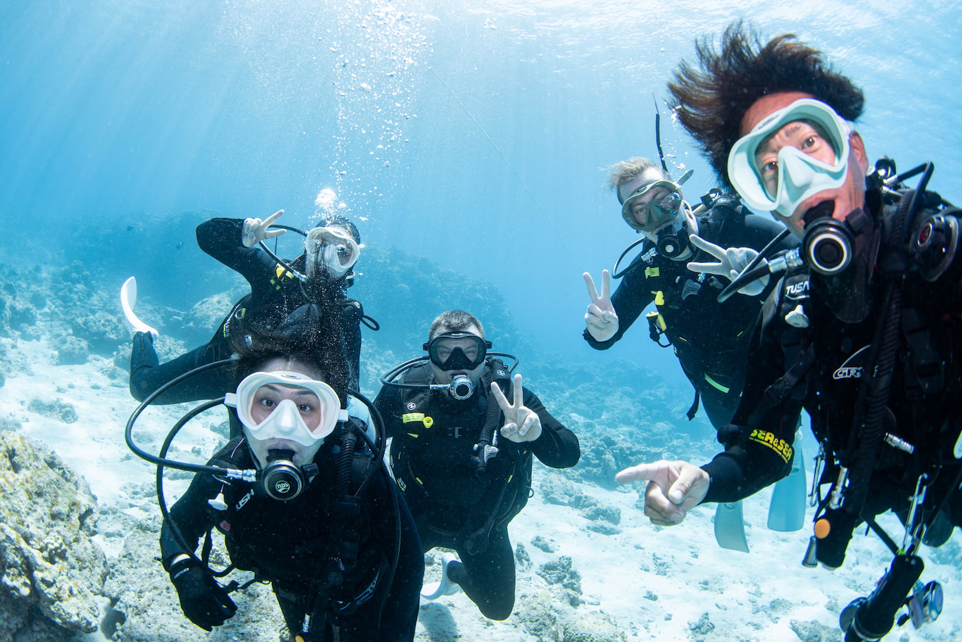 Group Photo with Guests Underwater in the Kerama Islands