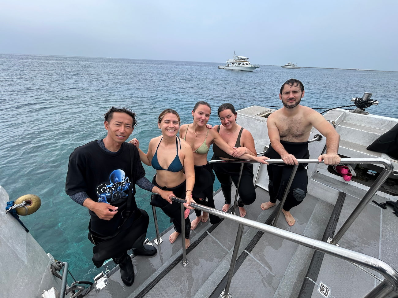 A group photo with guests on the boat.