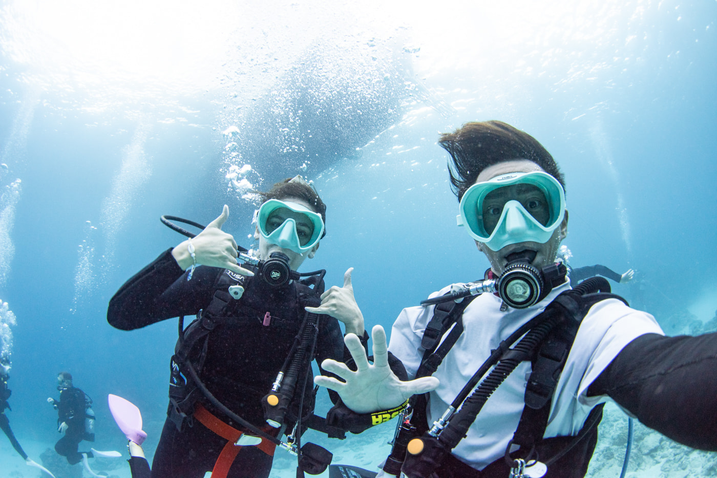 a photo with guests underwater