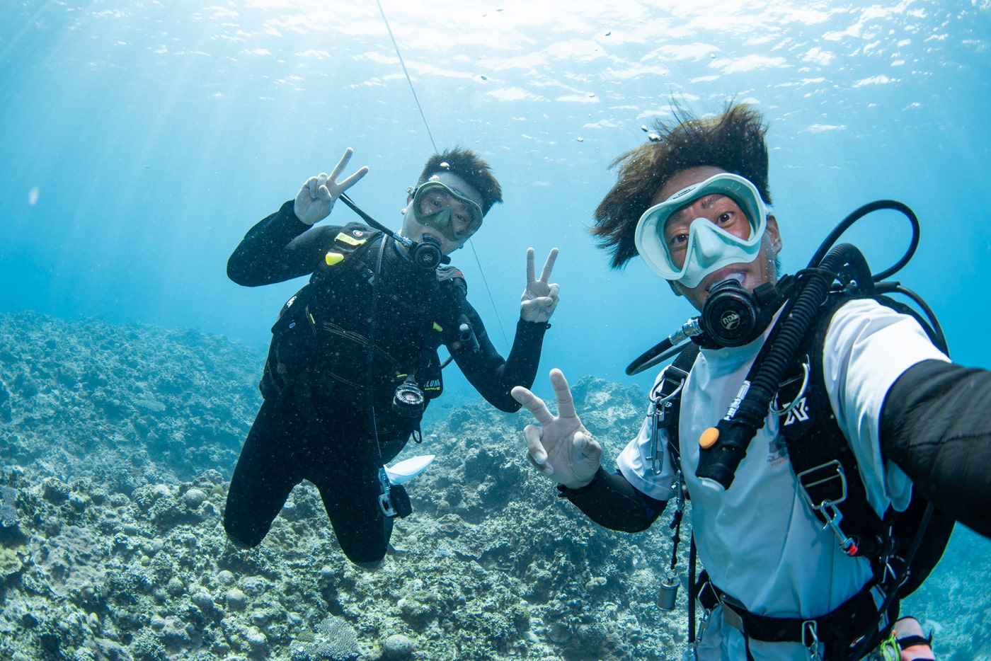 Group photo underwater with guest