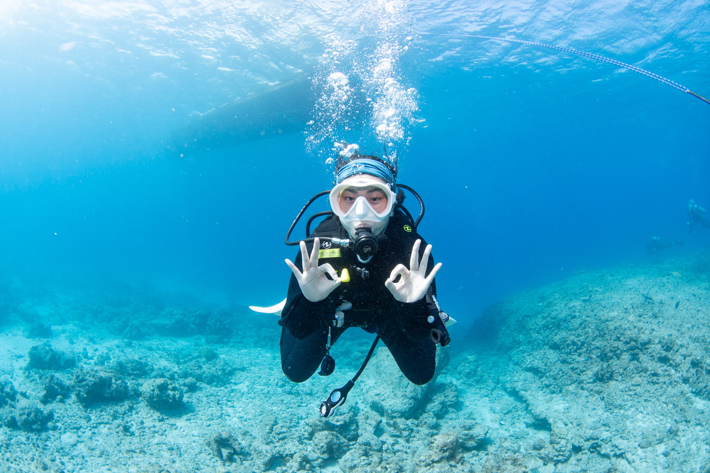 Guests enjoying scuba diving in the Kerama Islands.