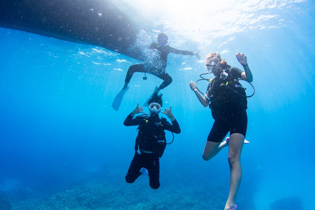 Guests enjoying scuba diving in the Kerama Islands.